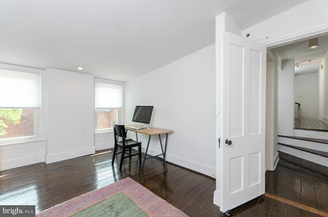 706 E Street Southeast Washington, DC 20003 - Photo 18 of 19 a view of a workspace with furniture and a window