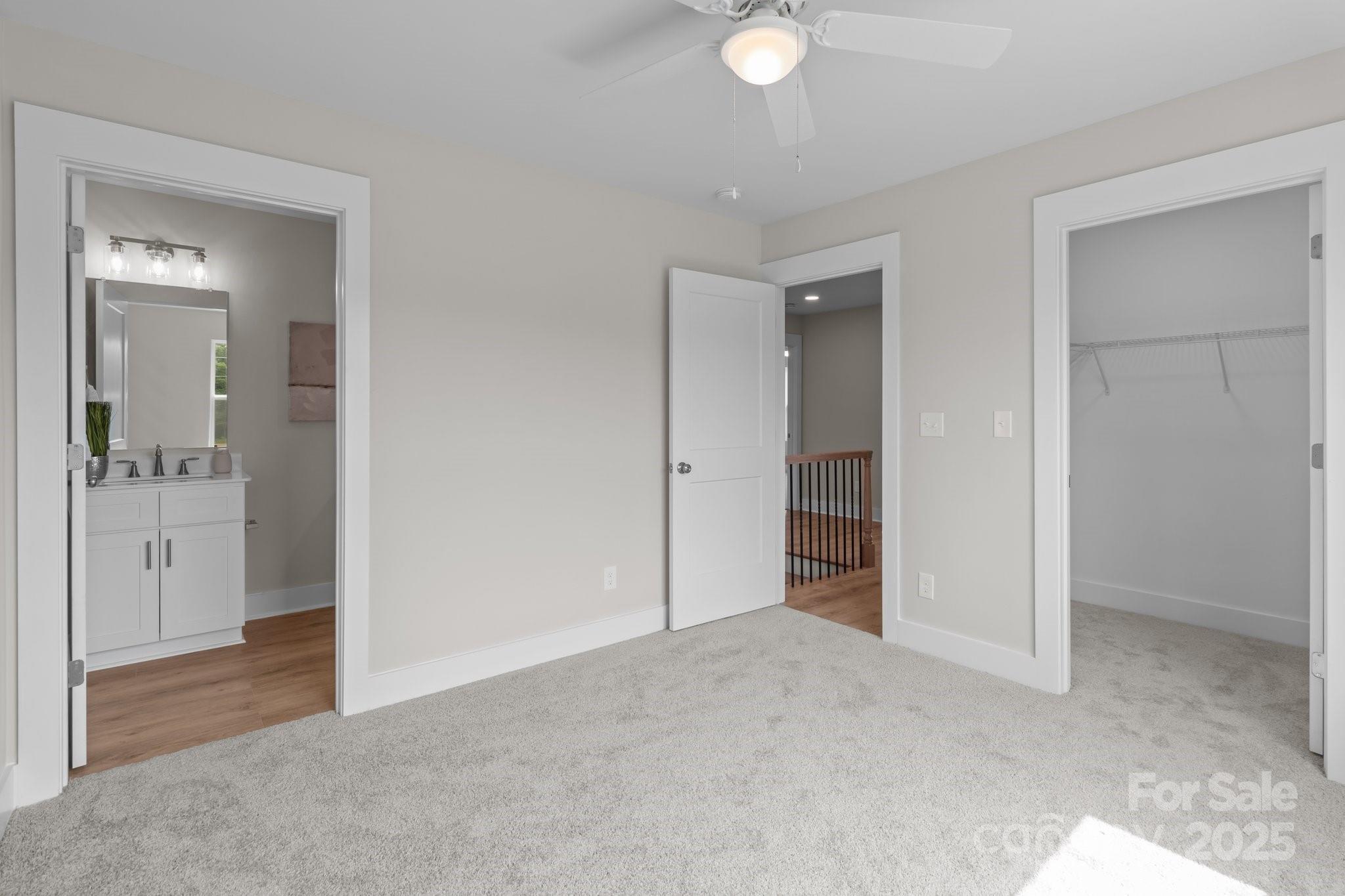 4949 Rimer Road, Unit 4 Concord, NC 28025 - Photo 29 of 46 an empty room with a bathroom and a sink