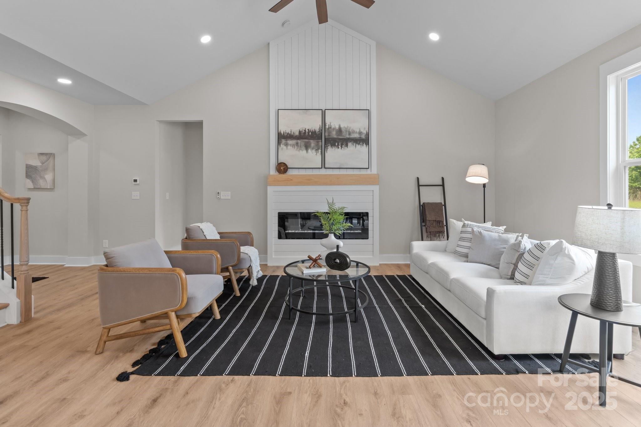 4949 Rimer Road, Unit 4 Concord, NC 28025 - Photo 3 of 46 a living room with furniture and a fireplace