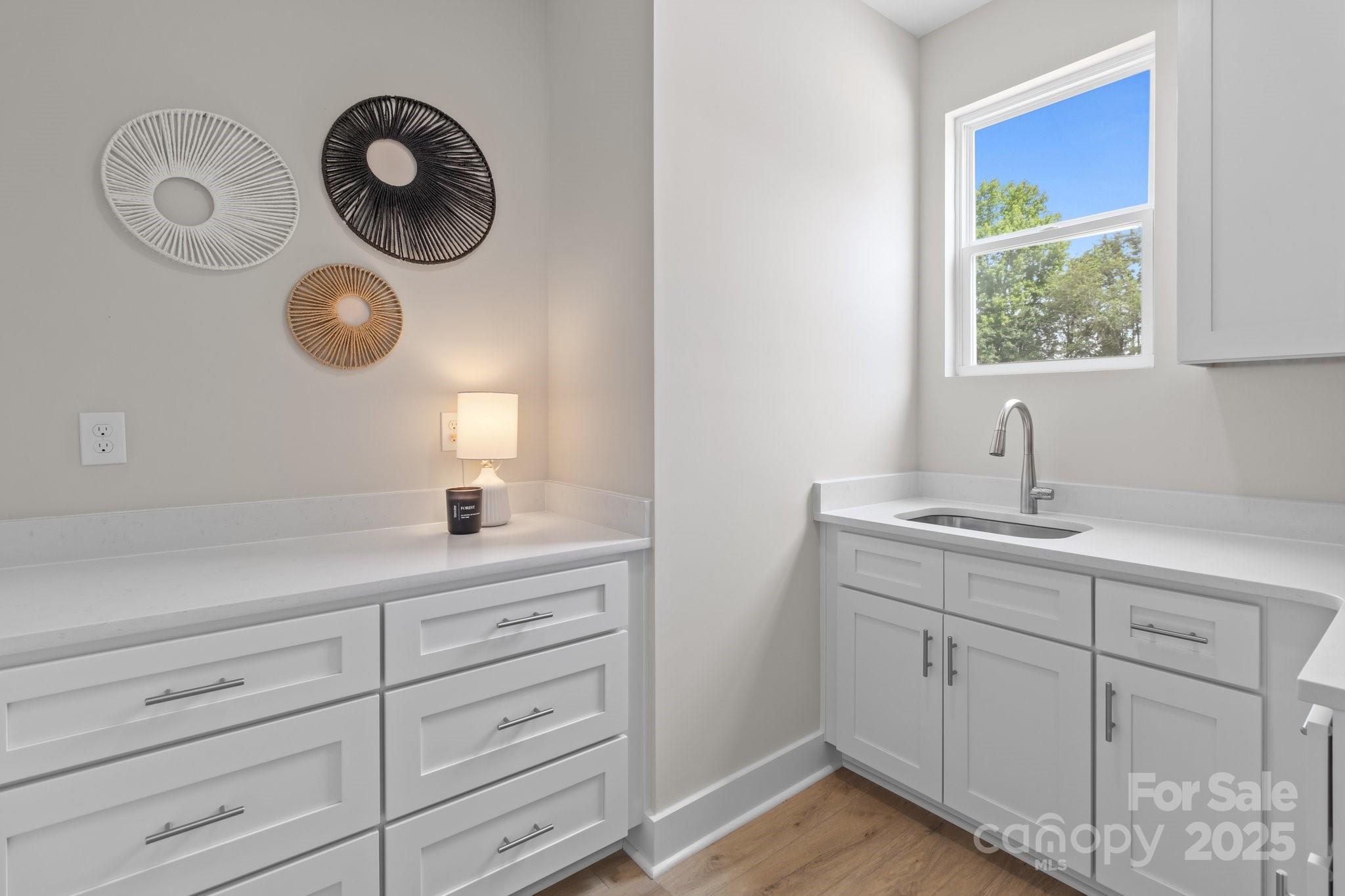 4949 Rimer Road, Unit 4 Concord, NC 28025 - Photo 9 of 46 a bathroom with a sink and a mirror