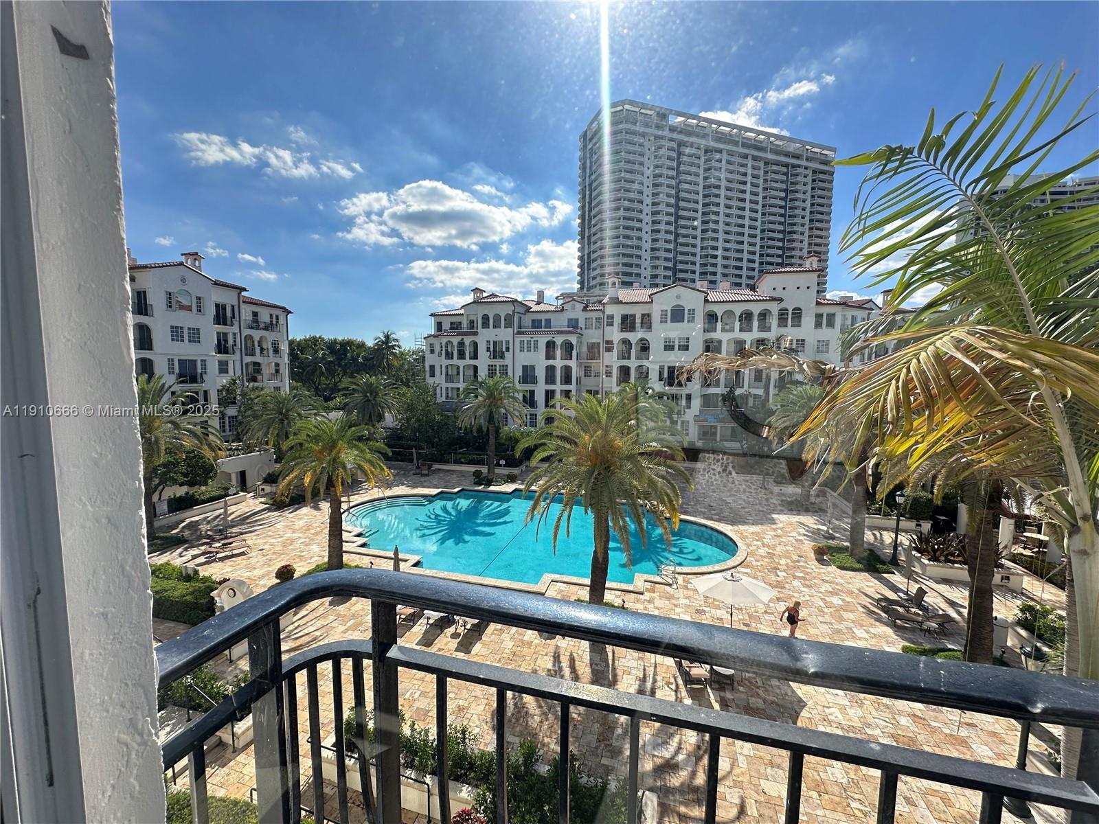 3900 Island Boulevard, Unit B303 Aventura, FL 33160 - Photo 23 of 35 a view of balcony with a potted plant and street view