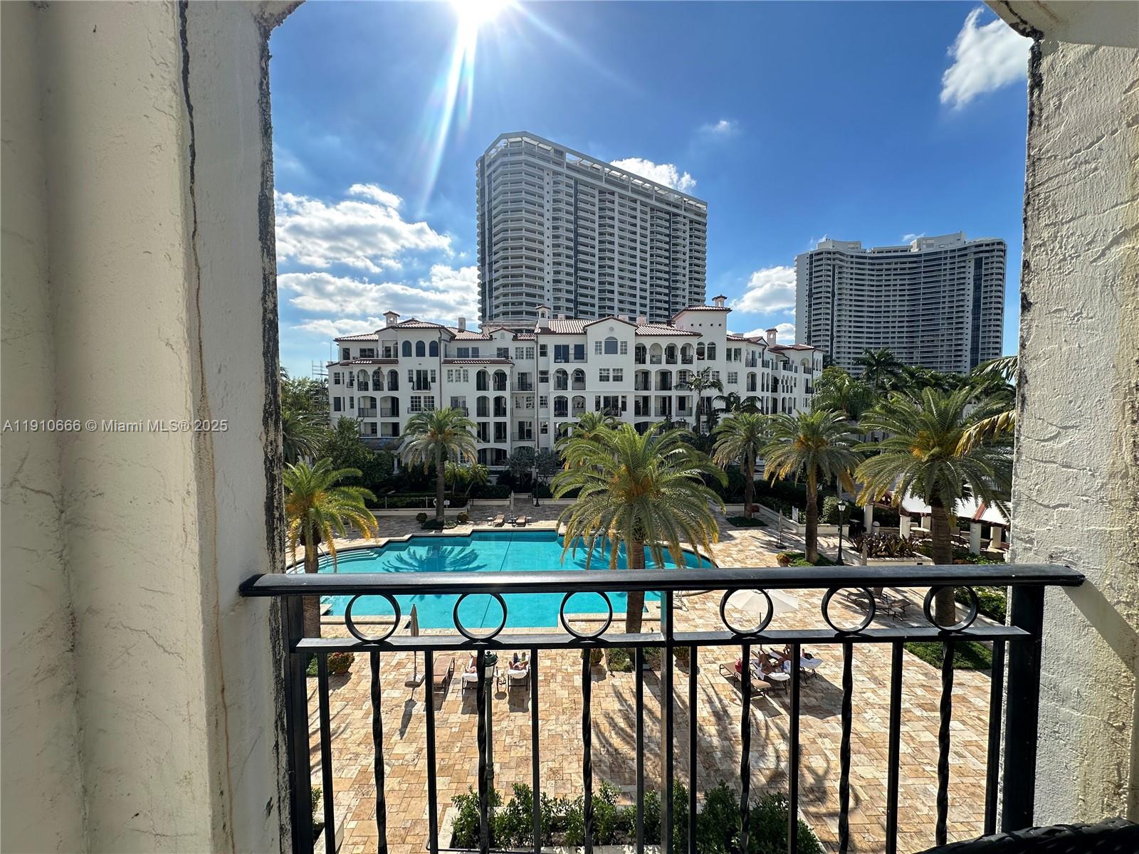 3900 Island Boulevard, Unit B303 Aventura, FL 33160 - Photo 9 of 35 a view of balcony with furniture
