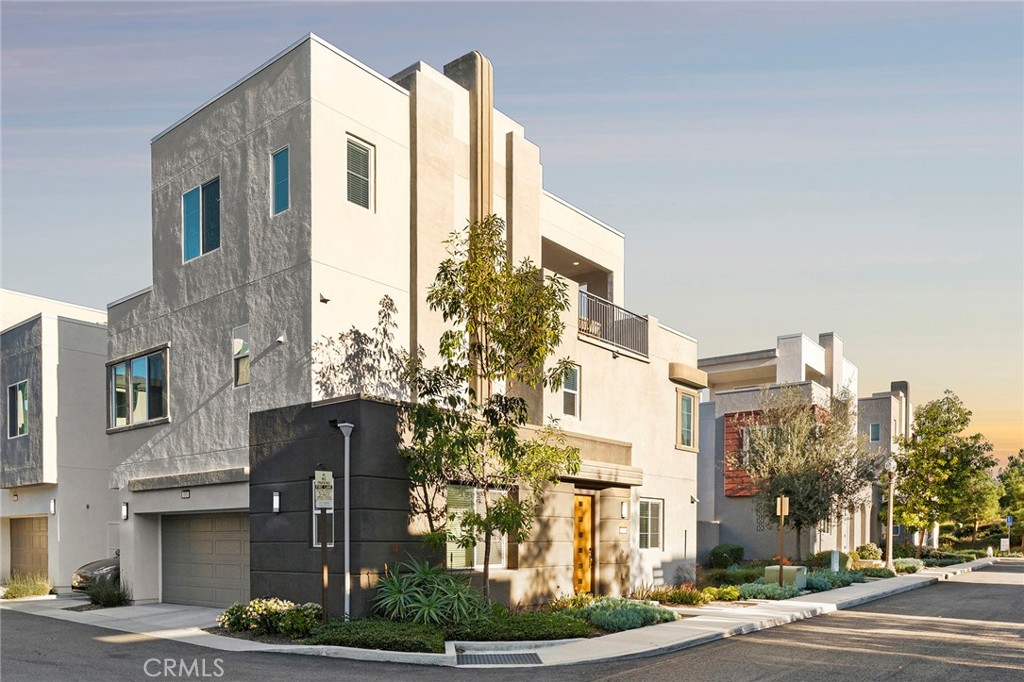 163 Tenor Irvine, CA 92618 - Photo 2 of 40 a city street lined with tall buildings