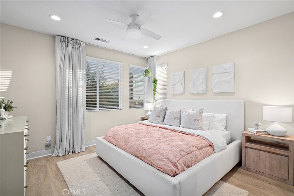 163 Tenor Irvine, CA 92618 - Photo 25 of 40 a bedroom with a large bed and a window