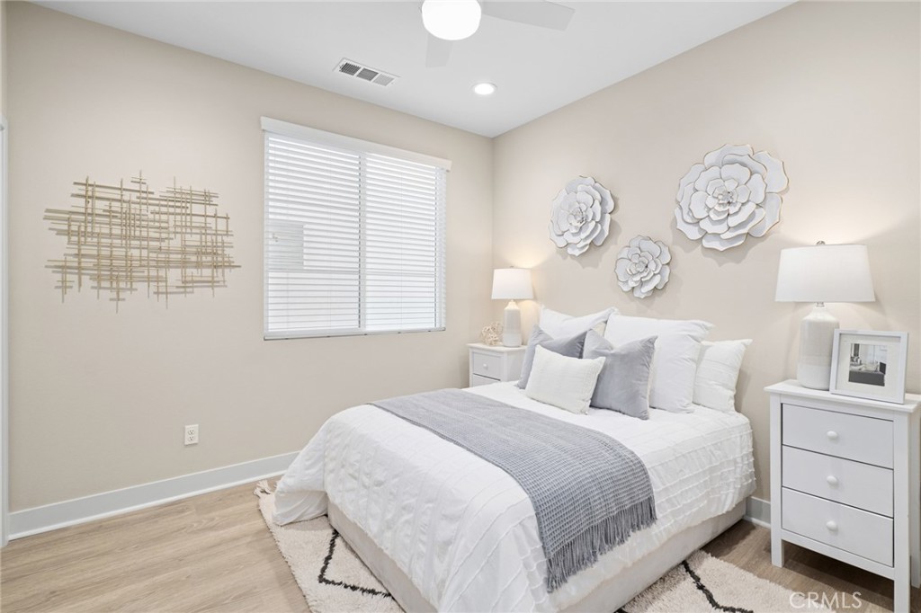 163 Tenor Irvine, CA 92618 - Photo 29 of 40 a bedroom with a bed and a window