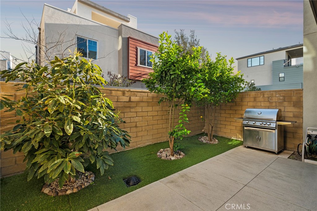 163 Tenor Irvine, CA 92618 - Photo 3 of 40 a house view with a garden space