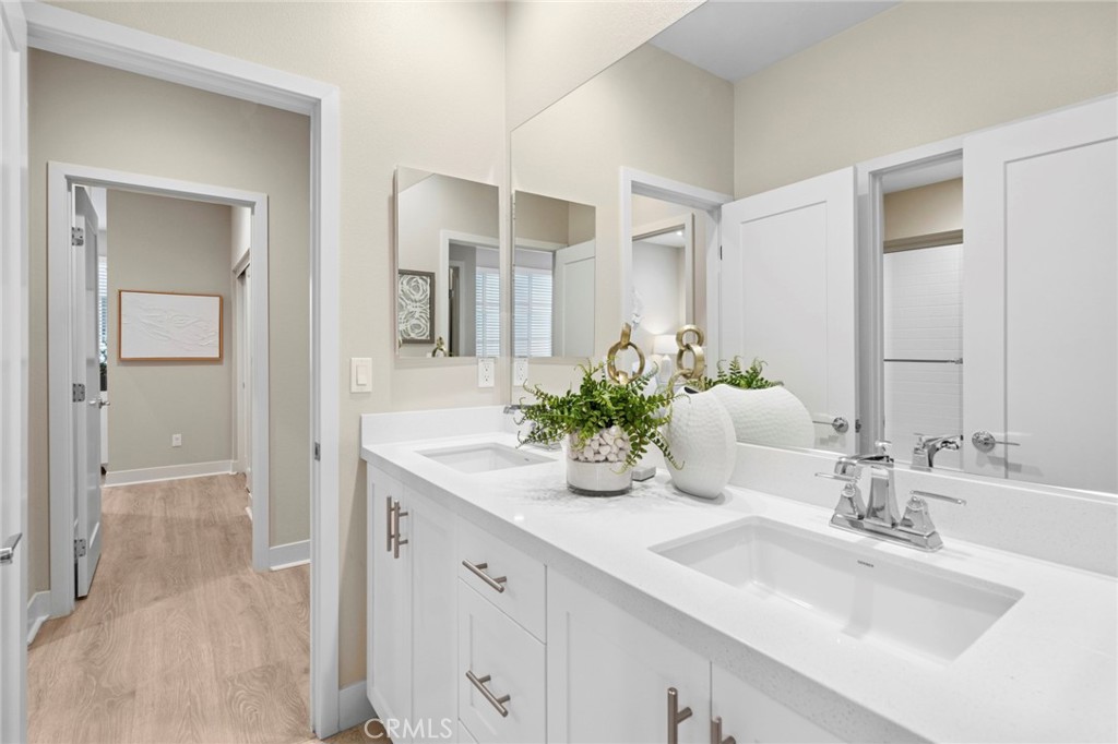 163 Tenor Irvine, CA 92618 - Photo 31 of 40 a bathroom with a sink a vanity and a mirror