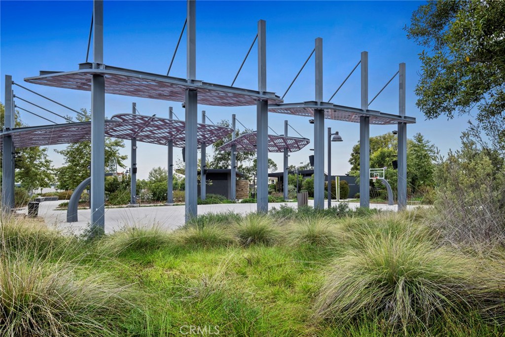 163 Tenor Irvine, CA 92618 - Photo 36 of 40 a view of a house with a yard and porch
