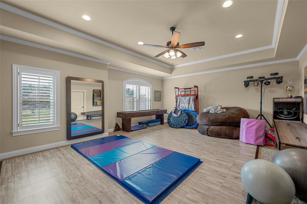 14690 Chapel Road Lorena, TX 76655 - Photo 27 of 40 a living room with furniture a rug and a window