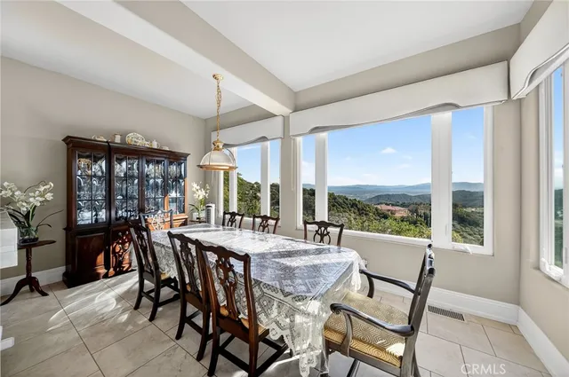 a kitchen with stainless steel appliances granite countertop a stove and a refrigerator