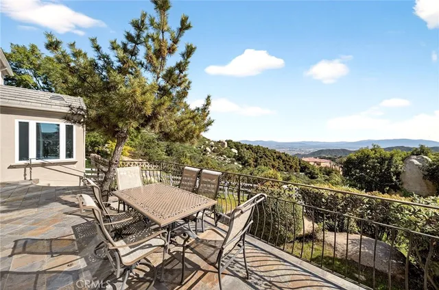 a view of a terrace with furniture