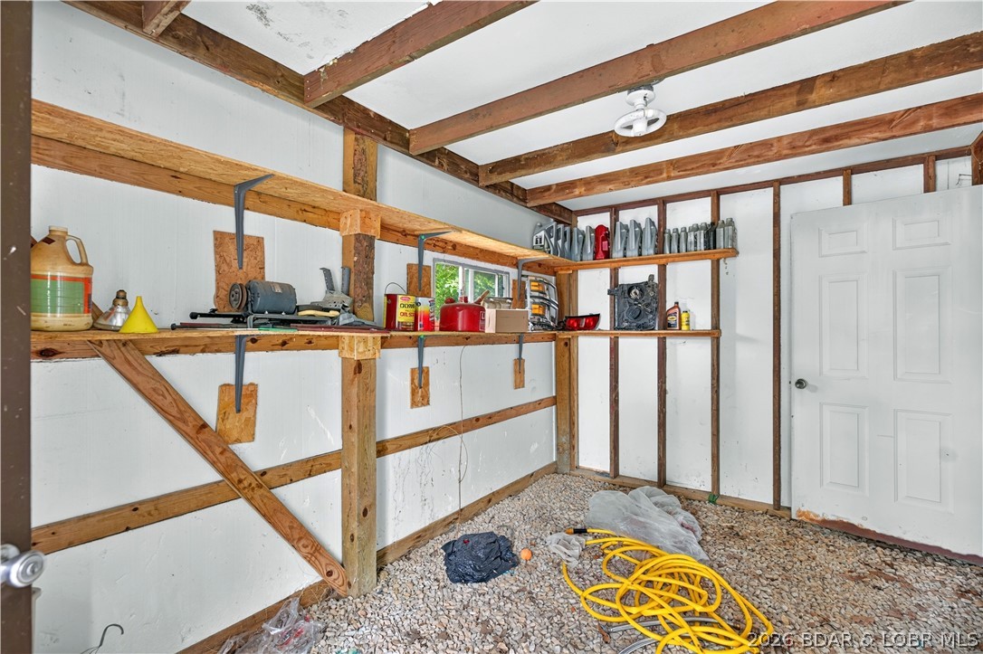 2084 Spring Cove Road Sunrise Beach, MO 65079 - Photo 58 of 63 Work space in 2 car garage