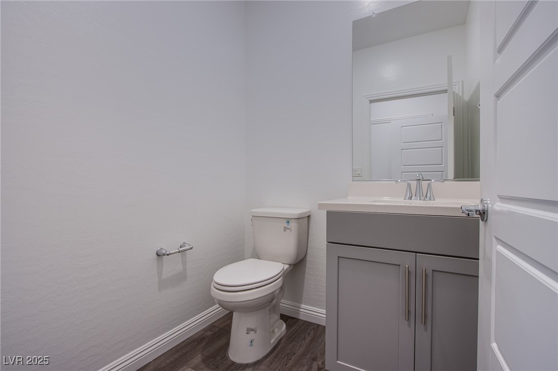 2555 Hampton Road, Unit 4109 Henderson, NV 89052 - Photo 23 of 38 Bathroom featuring vanity and wood finished floors