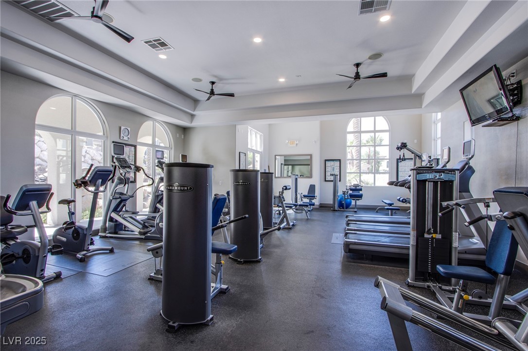 2555 Hampton Road, Unit 4109 Henderson, NV 89052 - Photo 26 of 38 Gym with a ceiling fan, a raised ceiling, and recessed lighting