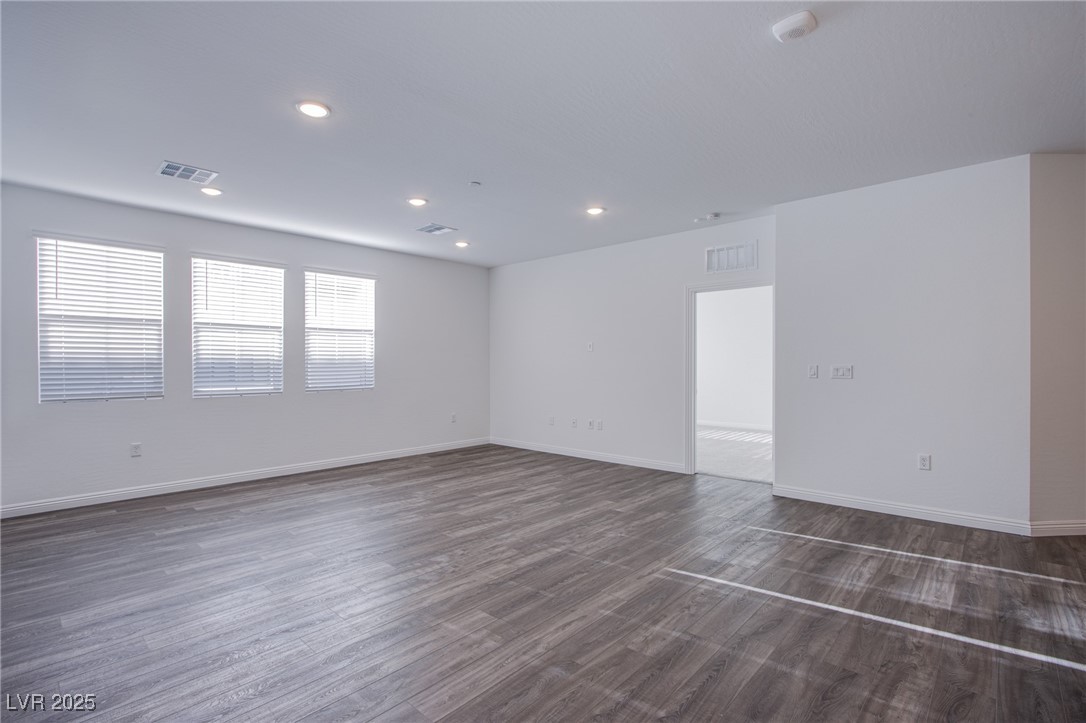 2555 Hampton Road, Unit 4109 Henderson, NV 89052 - Photo 8 of 38 Unfurnished room with dark wood finished floors and recessed lighting