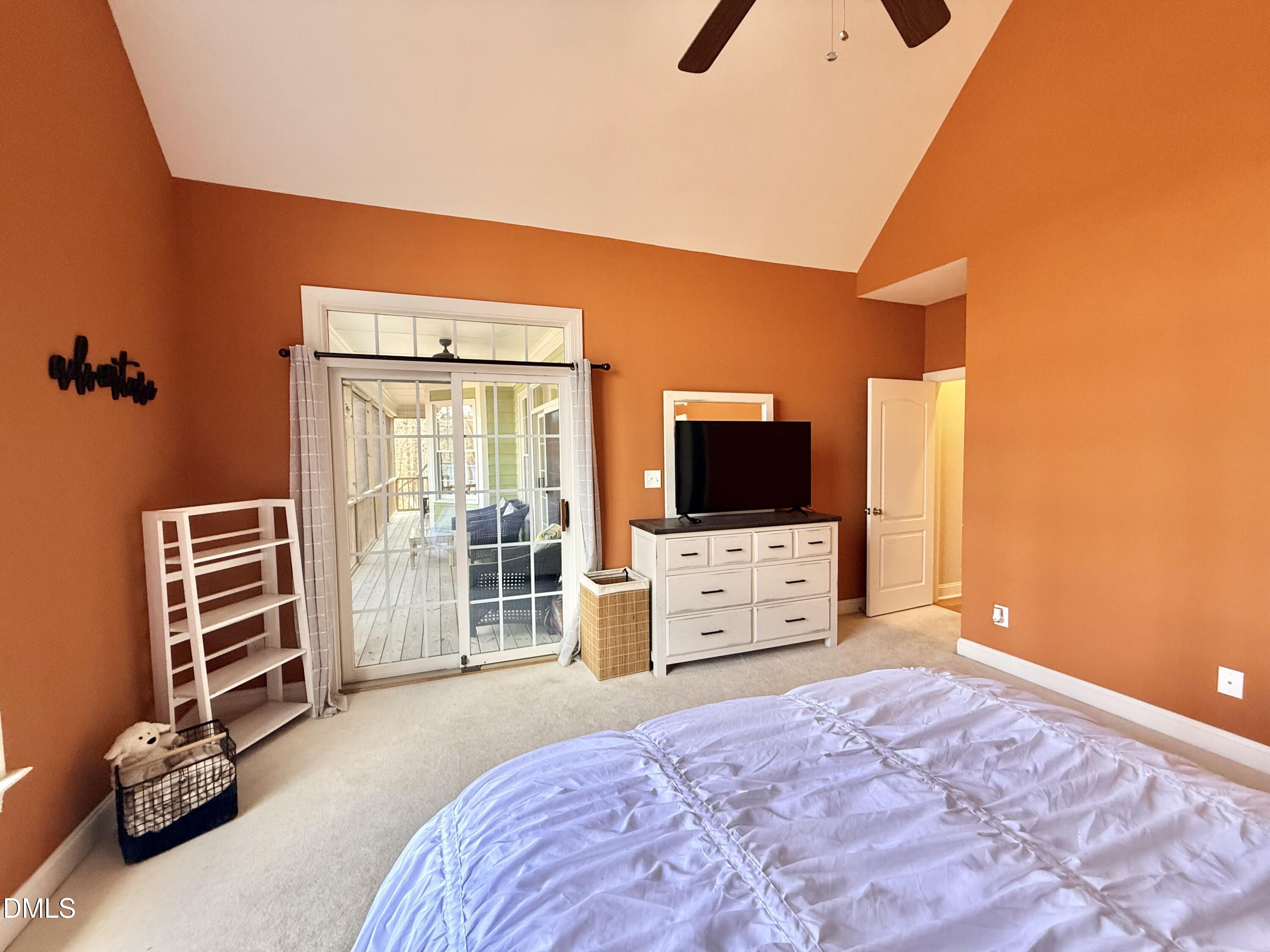 199 Oakwood Lane Roxboro, NC 27574 - Photo 29 of 82 a bedroom with a bed and a flat screen tv