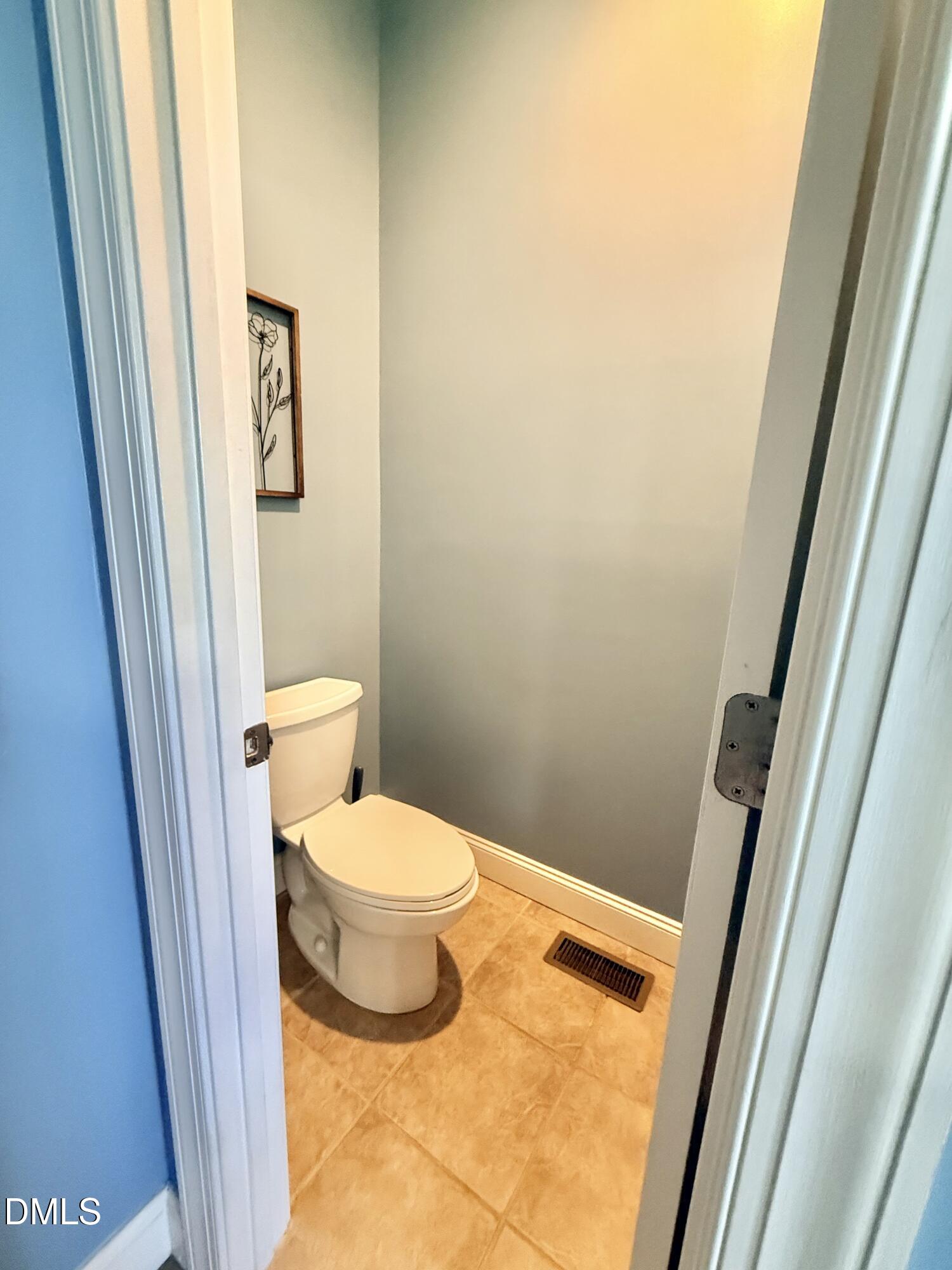 199 Oakwood Lane Roxboro, NC 27574 - Photo 38 of 82 a bathroom with a toilet and a shower