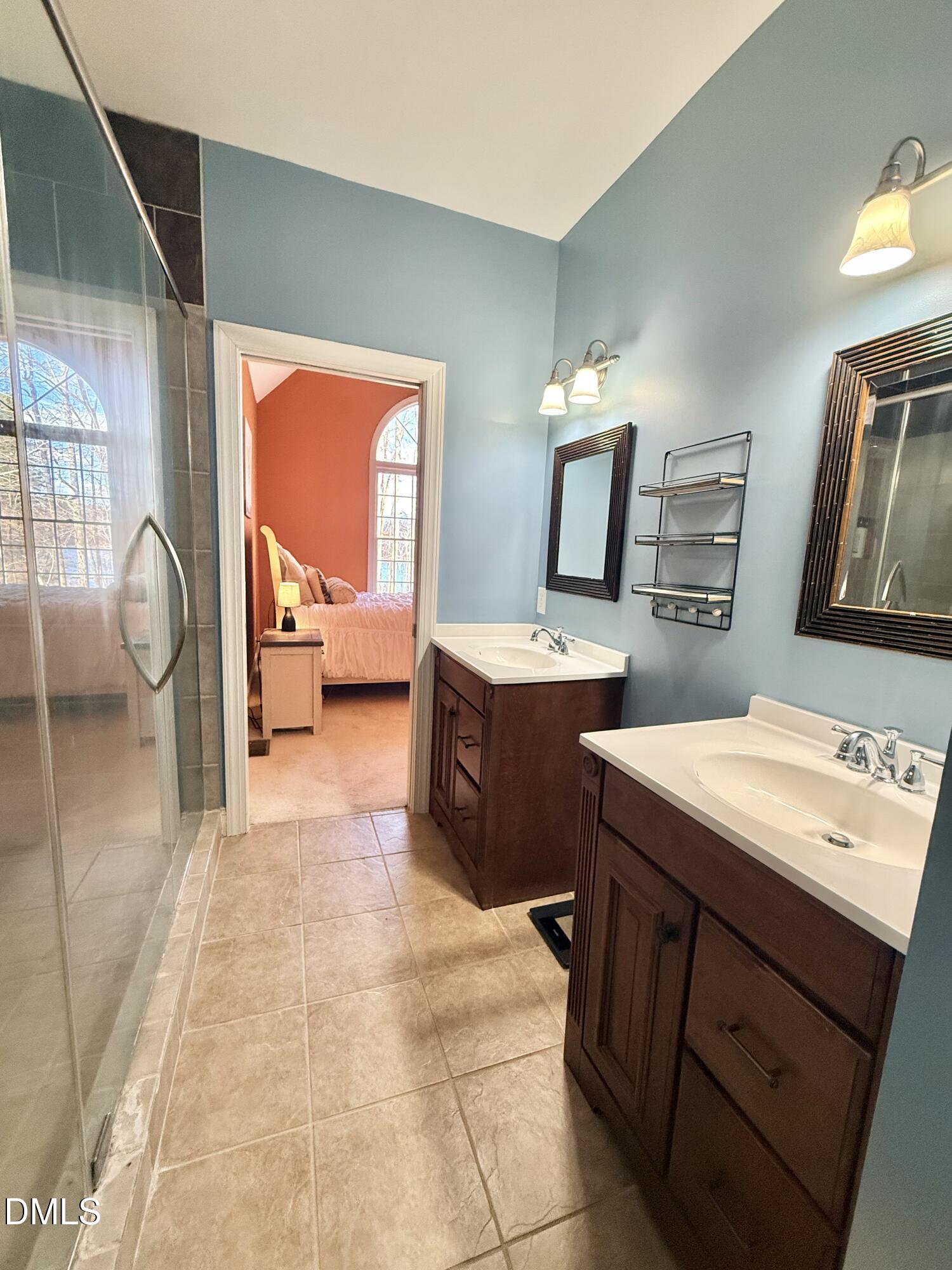 199 Oakwood Lane Roxboro, NC 27574 - Photo 40 of 82 a room with a washing machine and sink