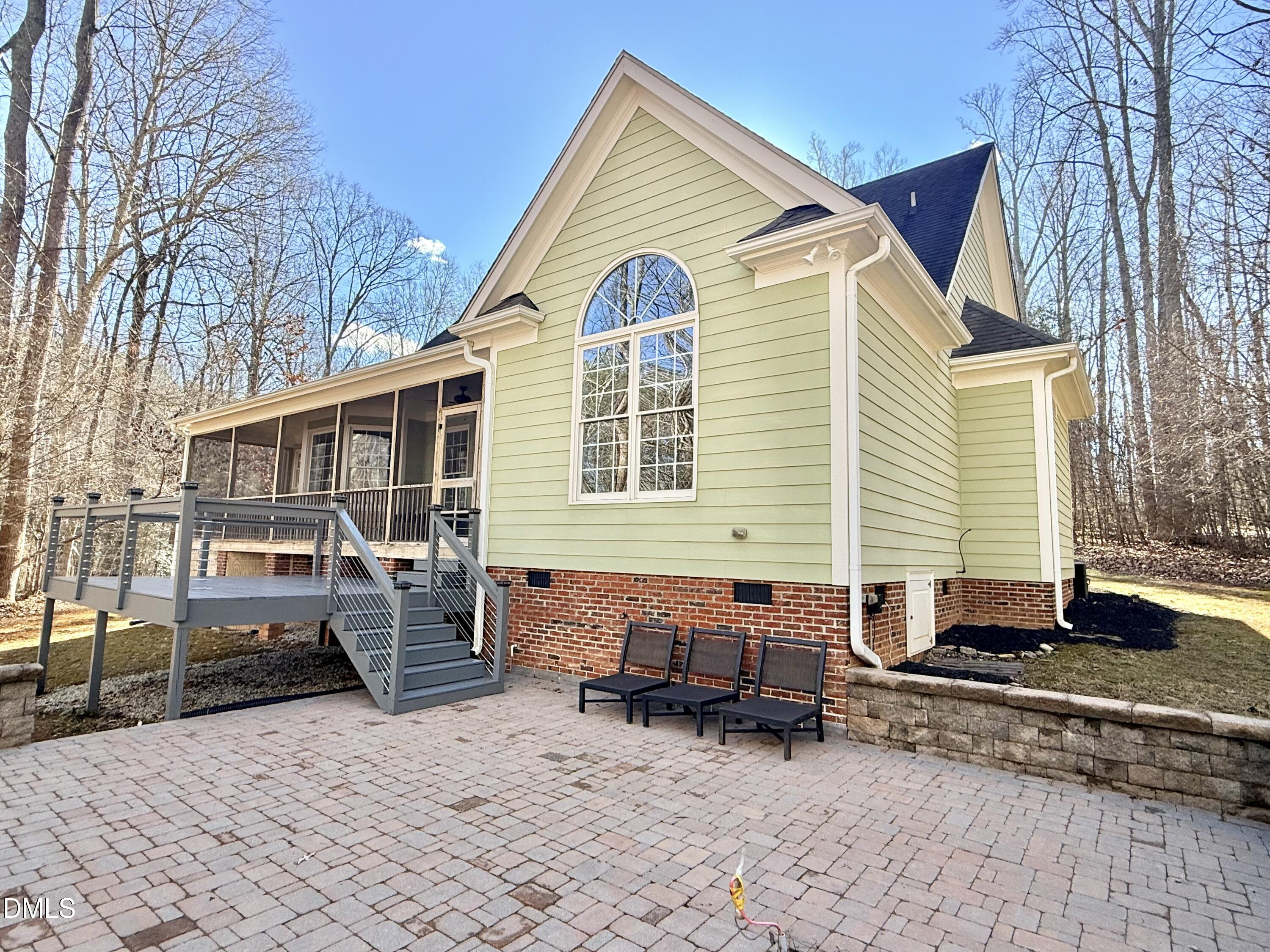 199 Oakwood Lane Roxboro, NC 27574 - Photo 56 of 82 a view of a house with a patio