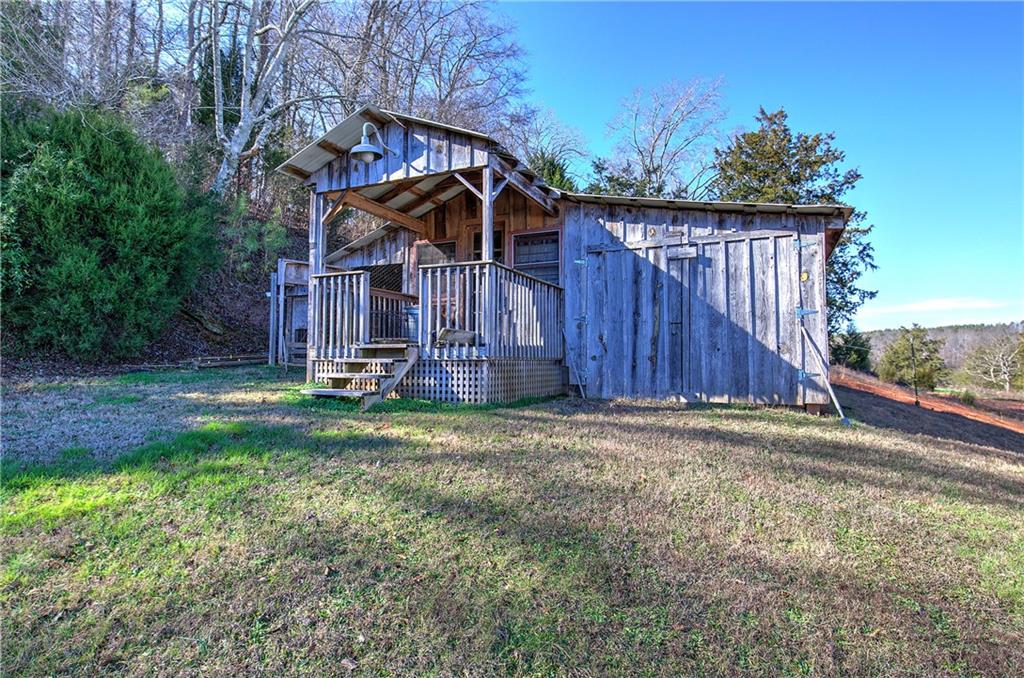 798 Mt Pleasant Road Rydal, GA 30171 - Photo 13 of 31 a view of a house with a yard