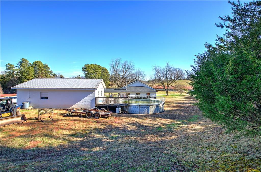 798 Mt Pleasant Road Rydal, GA 30171 - Photo 8 of 31 a view of house with outdoor space and swimming pool