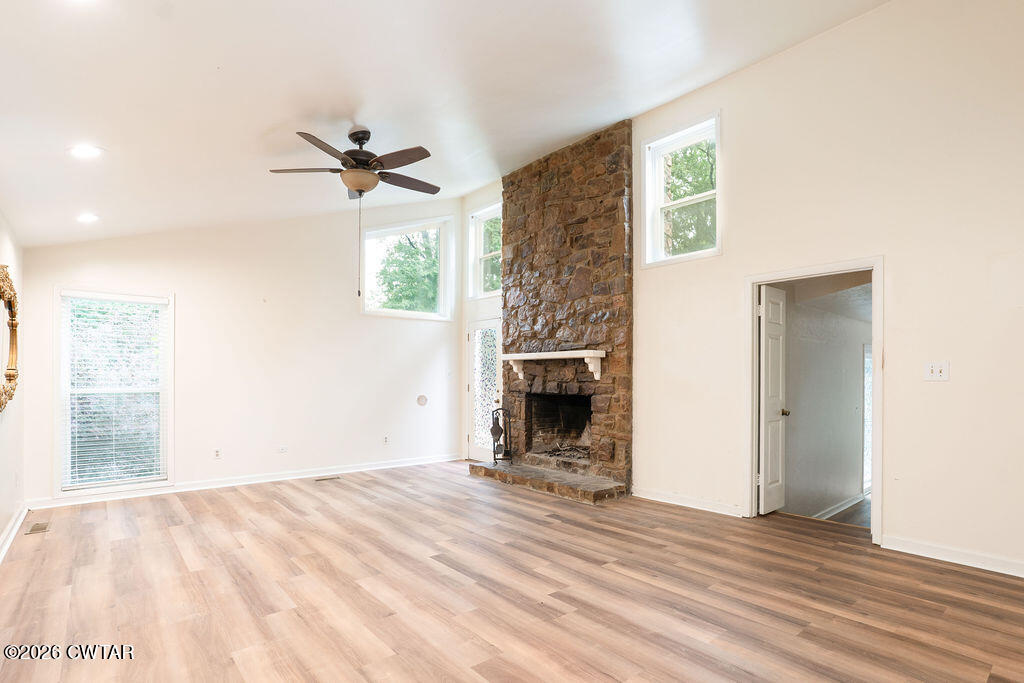 7 Timberlake Drive Jackson, TN 38305 - Photo 8 of 38 a view of empty room with wooden floor and fan