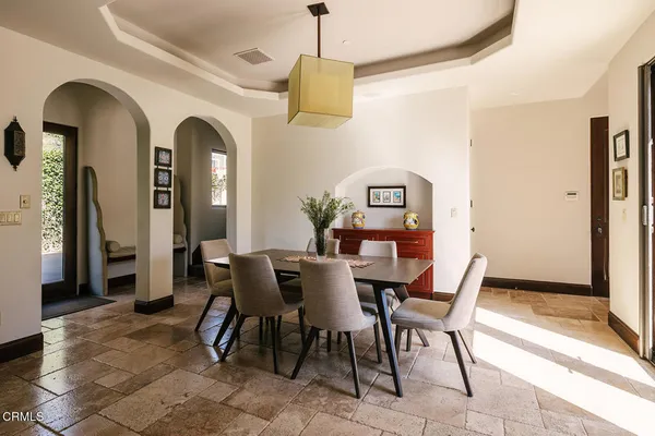 a white bath tub sitting next to a window