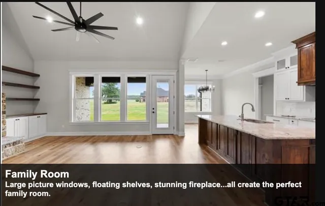 a view of kitchen with furniture and window