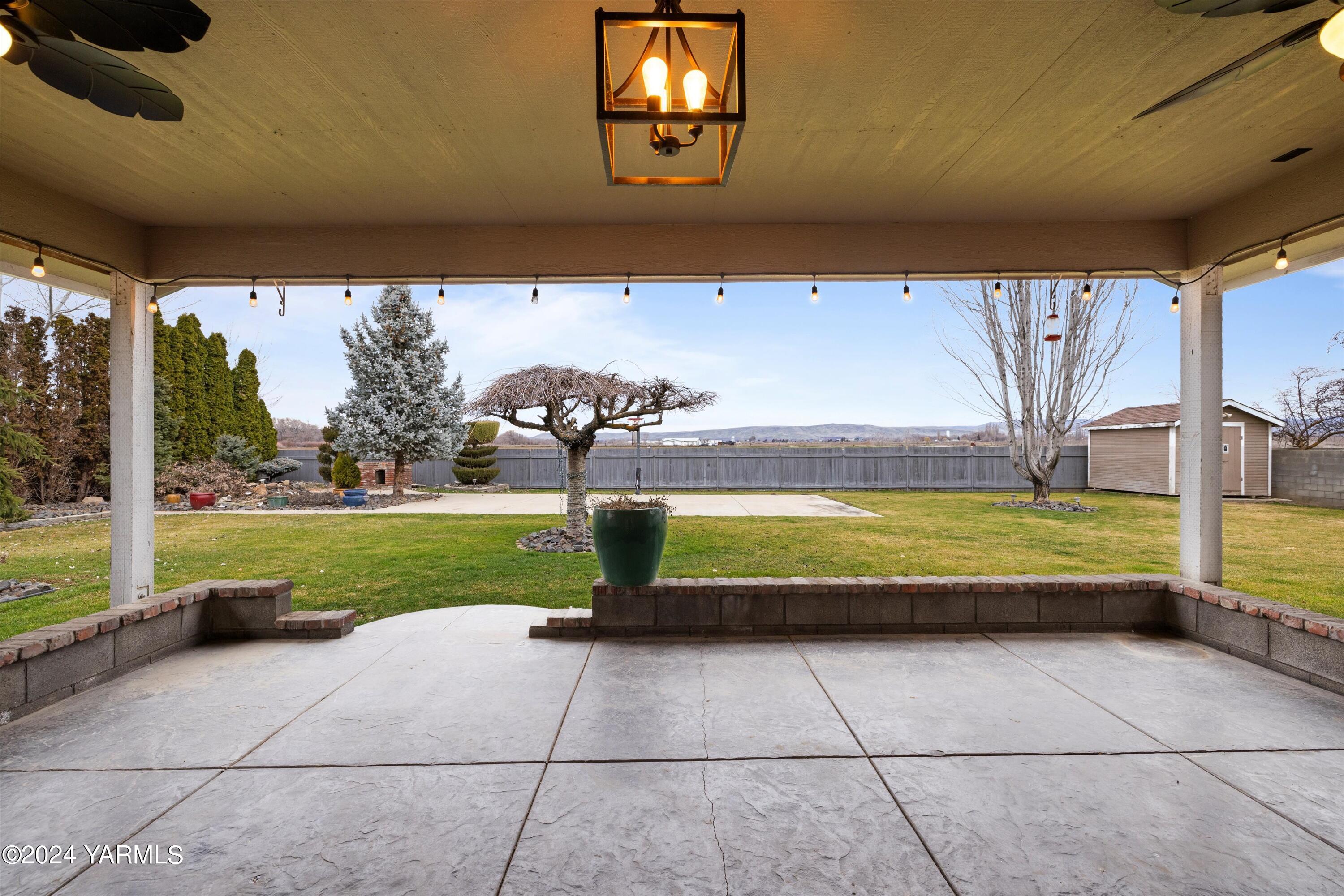 1511 Progressive Road Wapato, WA 98951 - Photo 30 of 36 a view of swimming pool with an outdoor space and seating area
