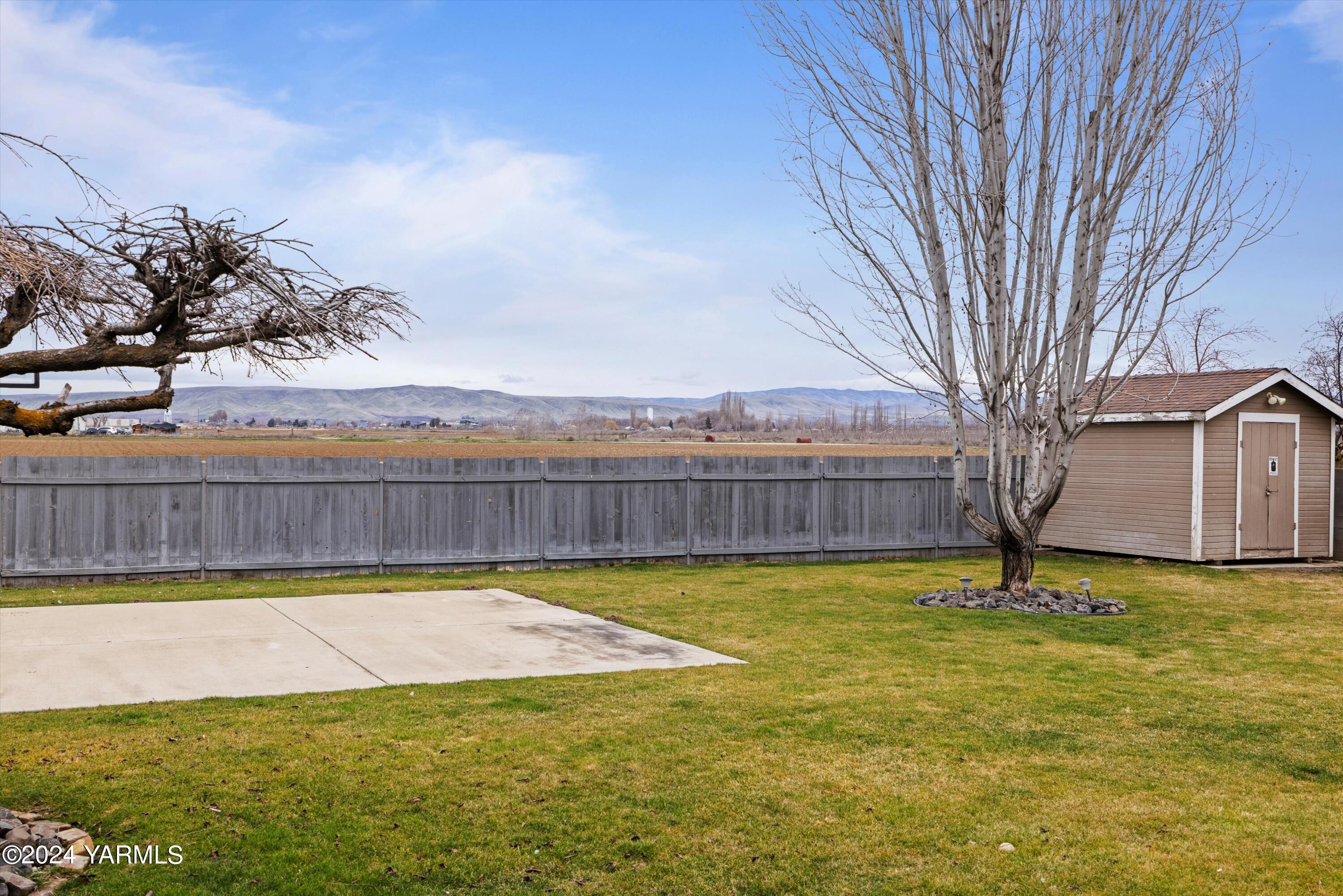 1511 Progressive Road Wapato, WA 98951 - Photo 31 of 36 a view of swimming pool with a yard
