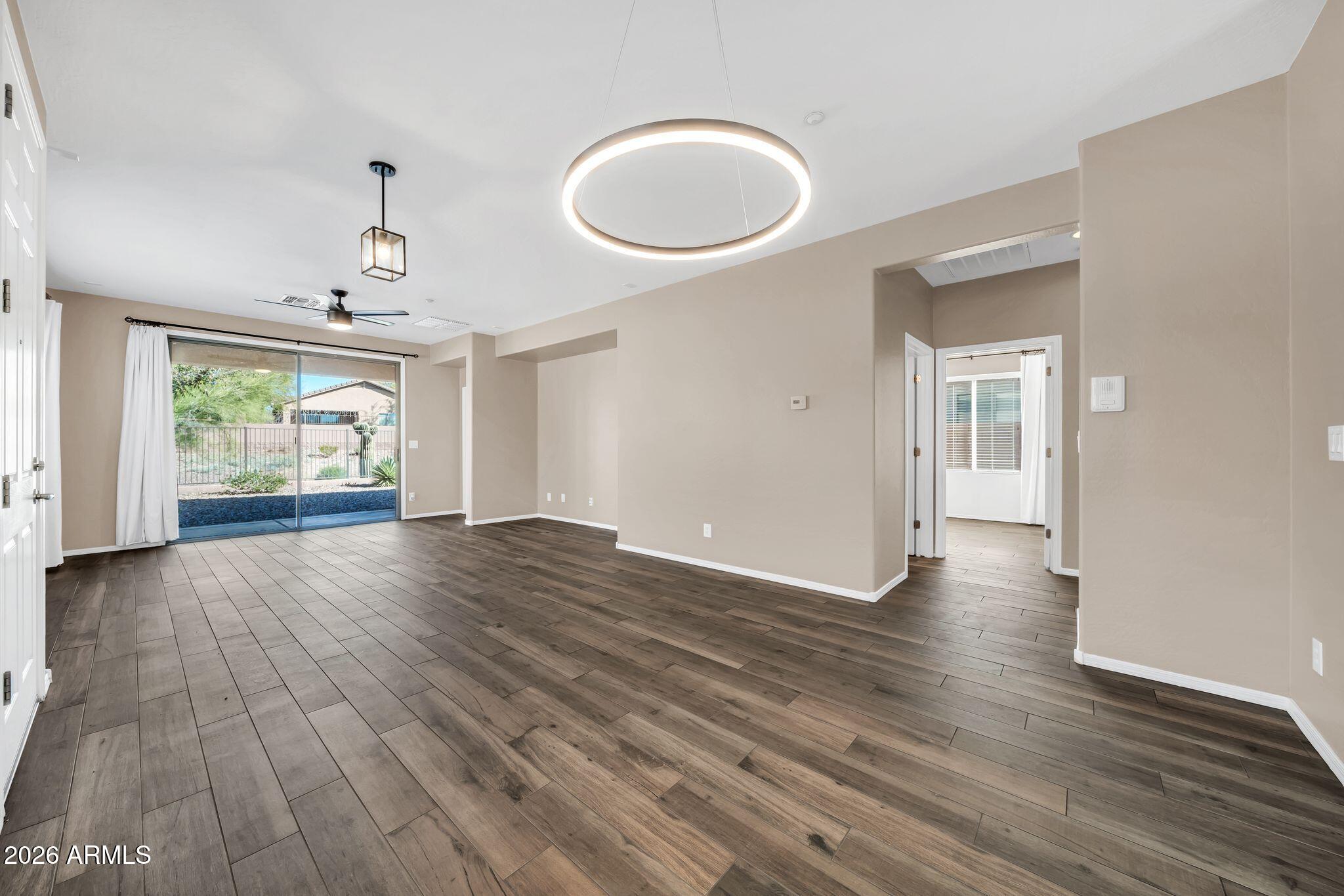 1834 West Owens Way Anthem, AZ 85086 - Photo 12 of 51 12 Dining Area of Great Room - 1834 W Ow