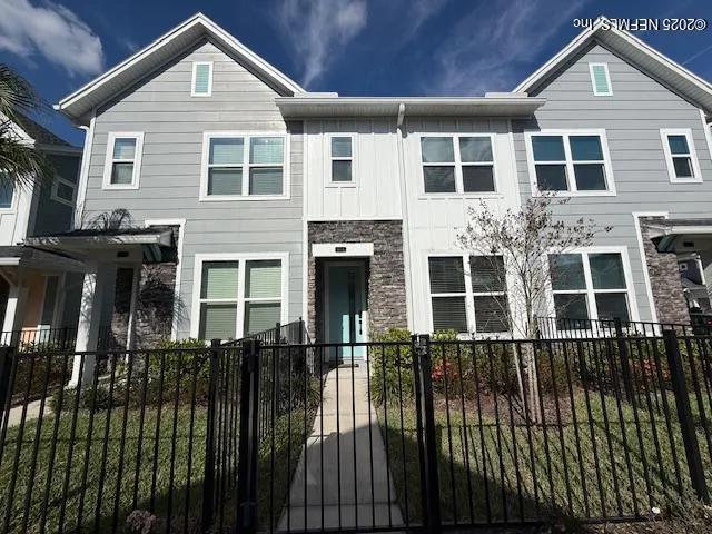 a front view of a house with a balcony