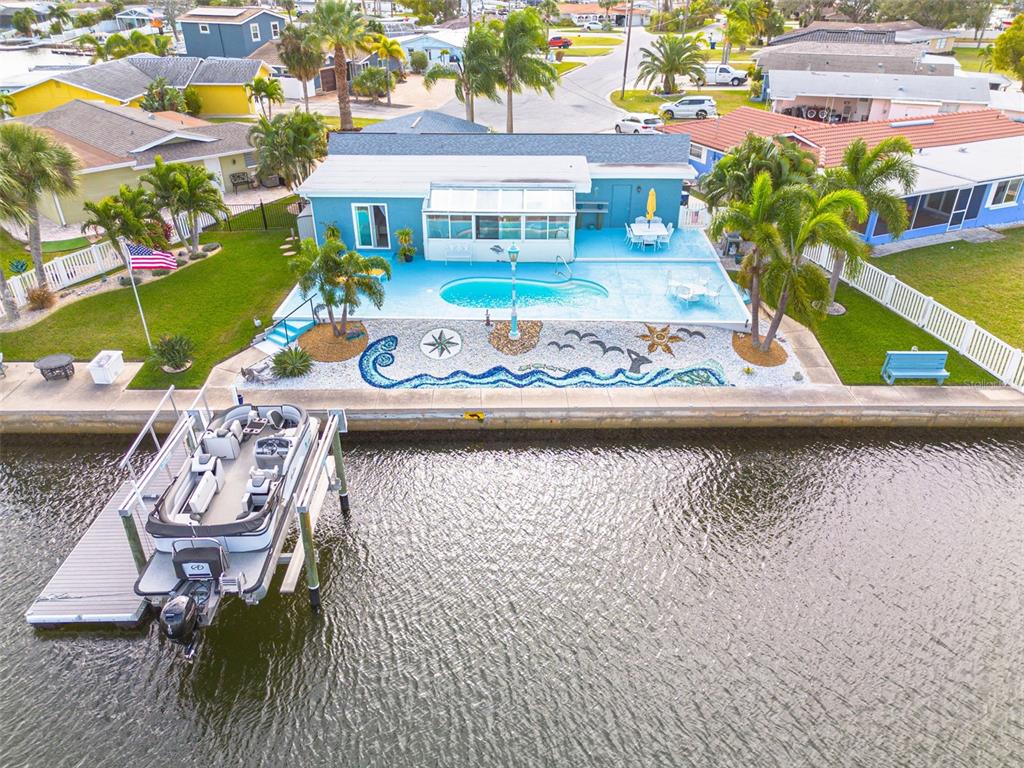 5105 Pelican Drive New Port Richey, FL 34652 - Photo 1 of 1 swimming pool view with a seating space