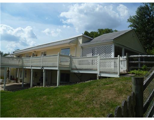 140 South Spring Valley Road Canonsburg, PA 15317 - Photo 1 of 18 Exterior Front. Covered Porch off of Living Room and Deck off of Kitchen. In-Law apartment and effeciency apartment on lower level.