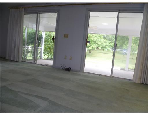 140 South Spring Valley Road Canonsburg, PA 15317 - Photo 2 of 18 Living Room. Double Sliding Glass Doors out to Covered Porch, just part of the appeal of this 14 x 27 foot Living Room
