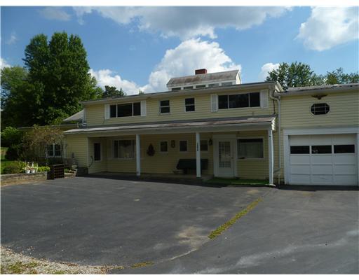 140 South Spring Valley Road Canonsburg, PA 15317 - Photo 5 of 18 Parking Lot/Garage. View of parking area 2 car garage. Possible Business Entry.