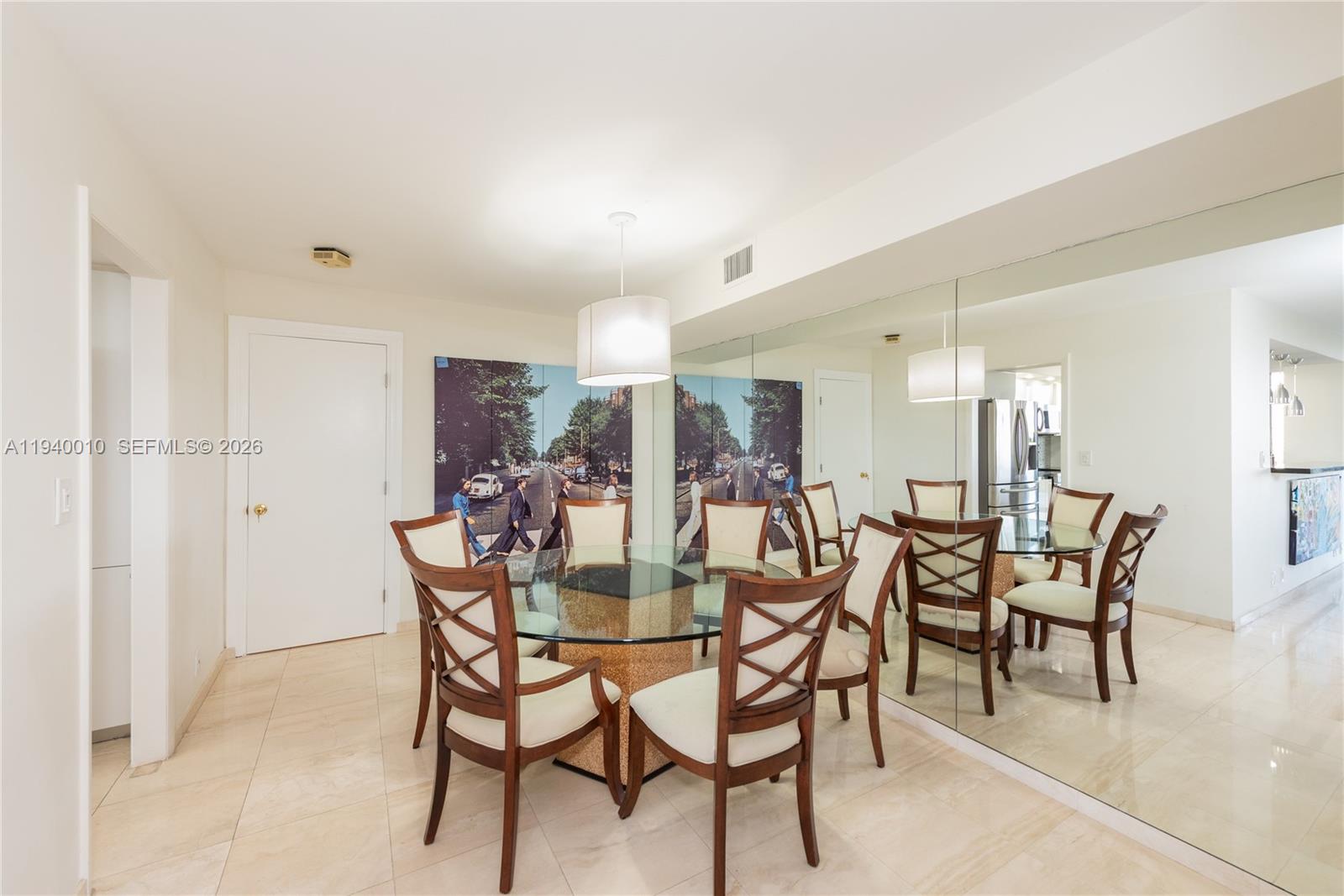 4000 Towerside Terrace, Unit 805 Miami, FL 33138 - Photo 8 of 18 a dining room with furniture and window