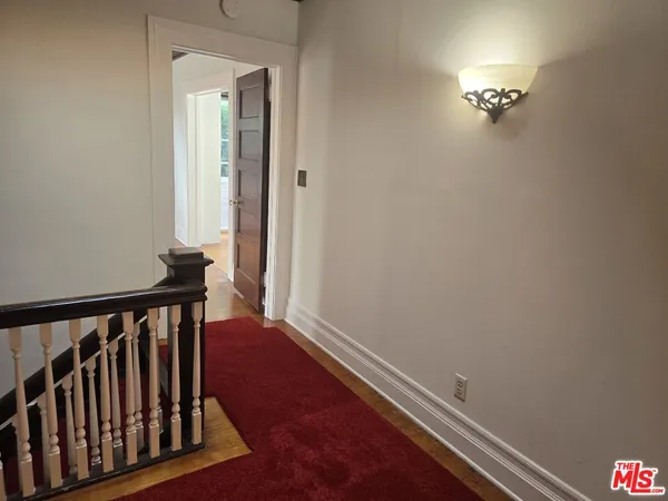 a view of a hallway with entryway