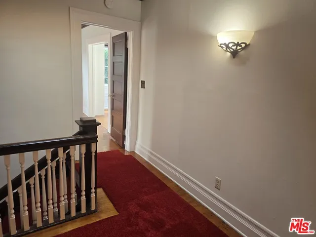 a view of a hallway with entryway