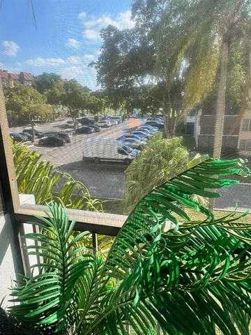 a view of a backyard of the house