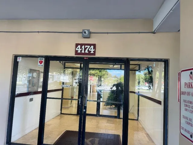 a view of a water heater room with a large window