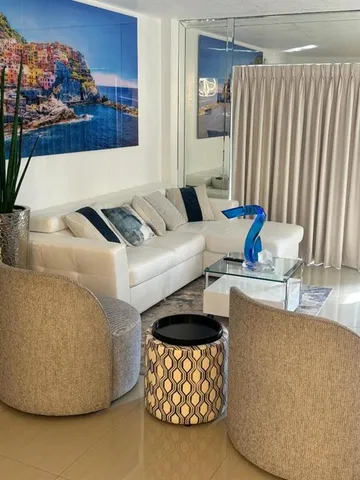 a living room with furniture and a couch