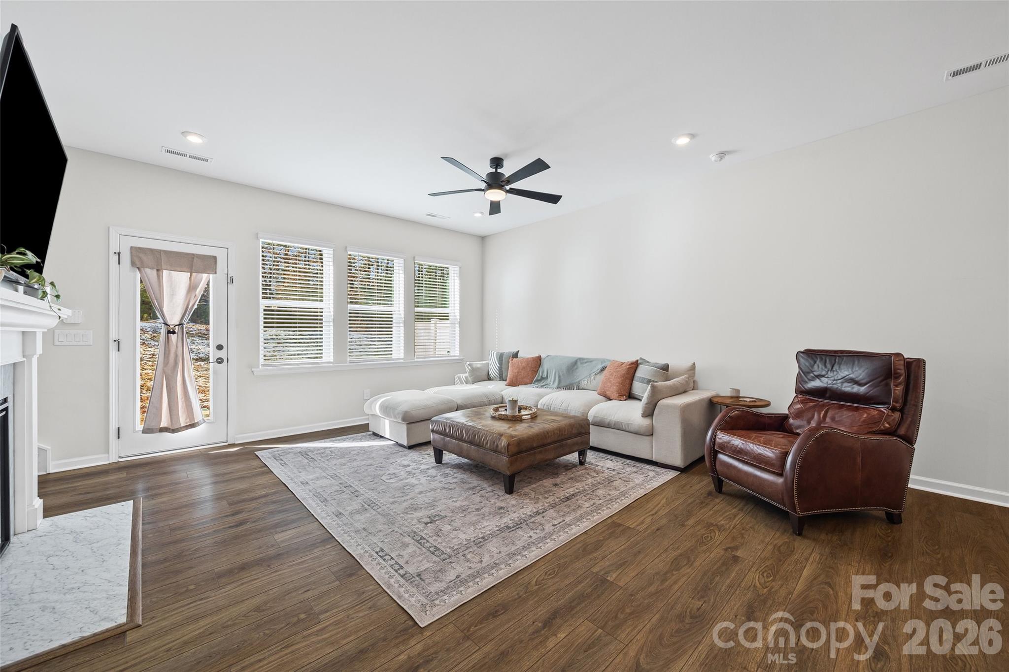 285 Brooks Springs Drive Fort Mill, SC 29708 - Photo 12 of 28 a living room with furniture window and wooden floor