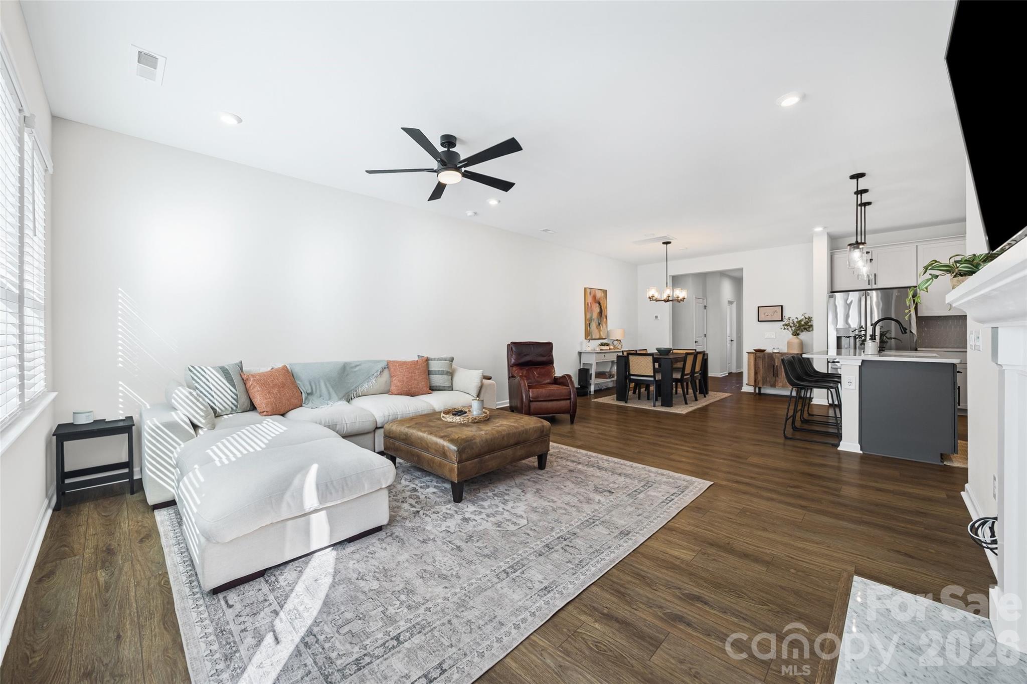 285 Brooks Springs Drive Fort Mill, SC 29708 - Photo 14 of 28 a living room with furniture and a flat screen tv