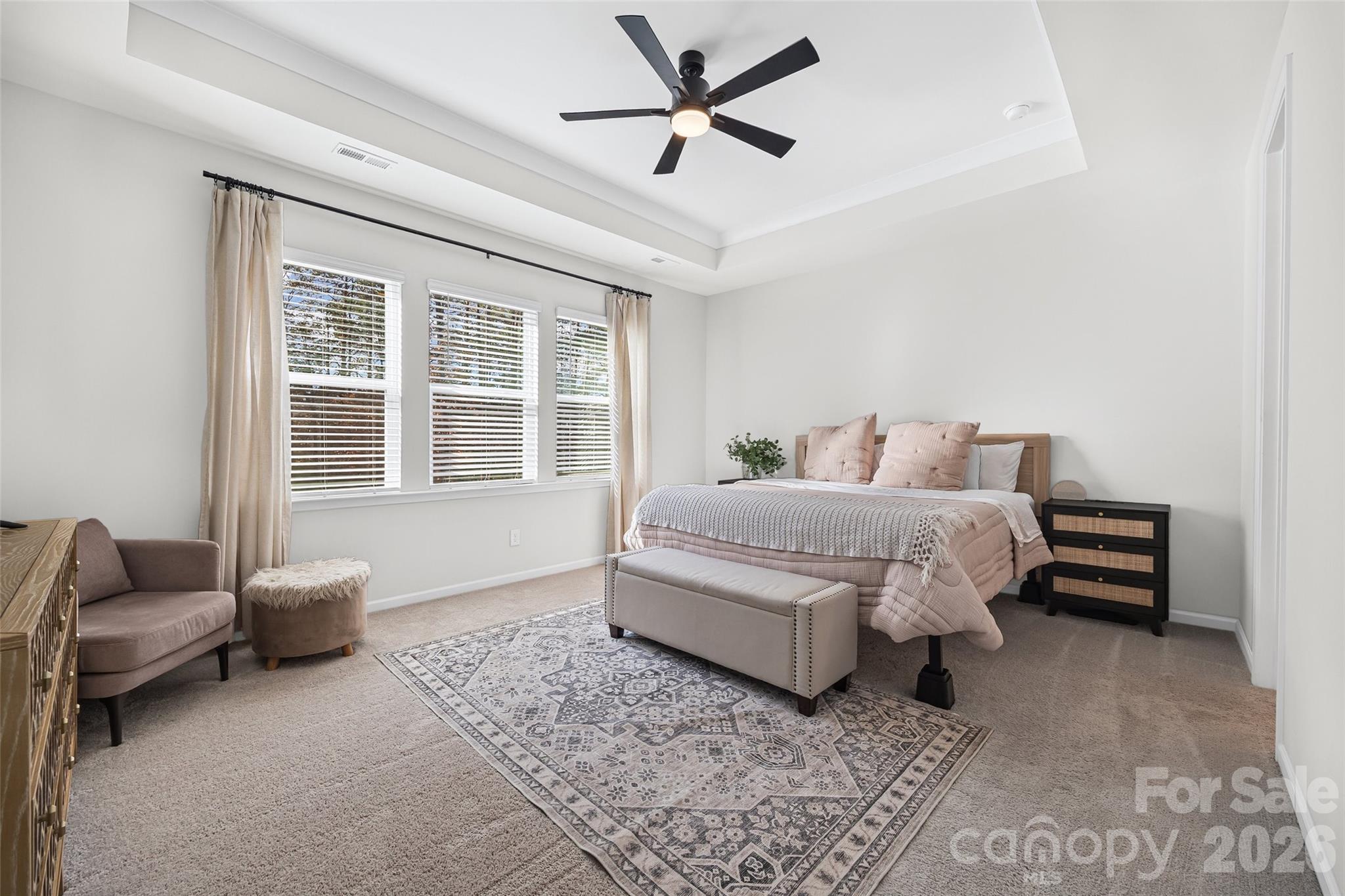 285 Brooks Springs Drive Fort Mill, SC 29708 - Photo 17 of 28 a bedroom with a bed couch and a window