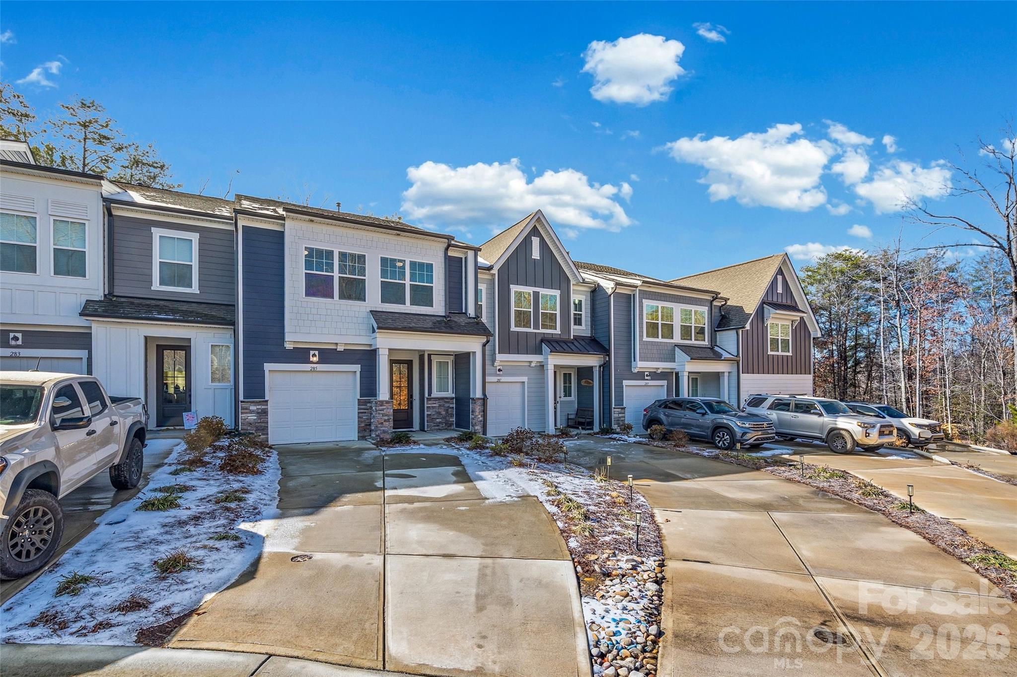 285 Brooks Springs Drive Fort Mill, SC 29708 - Photo 2 of 28 a view of a building with many windows