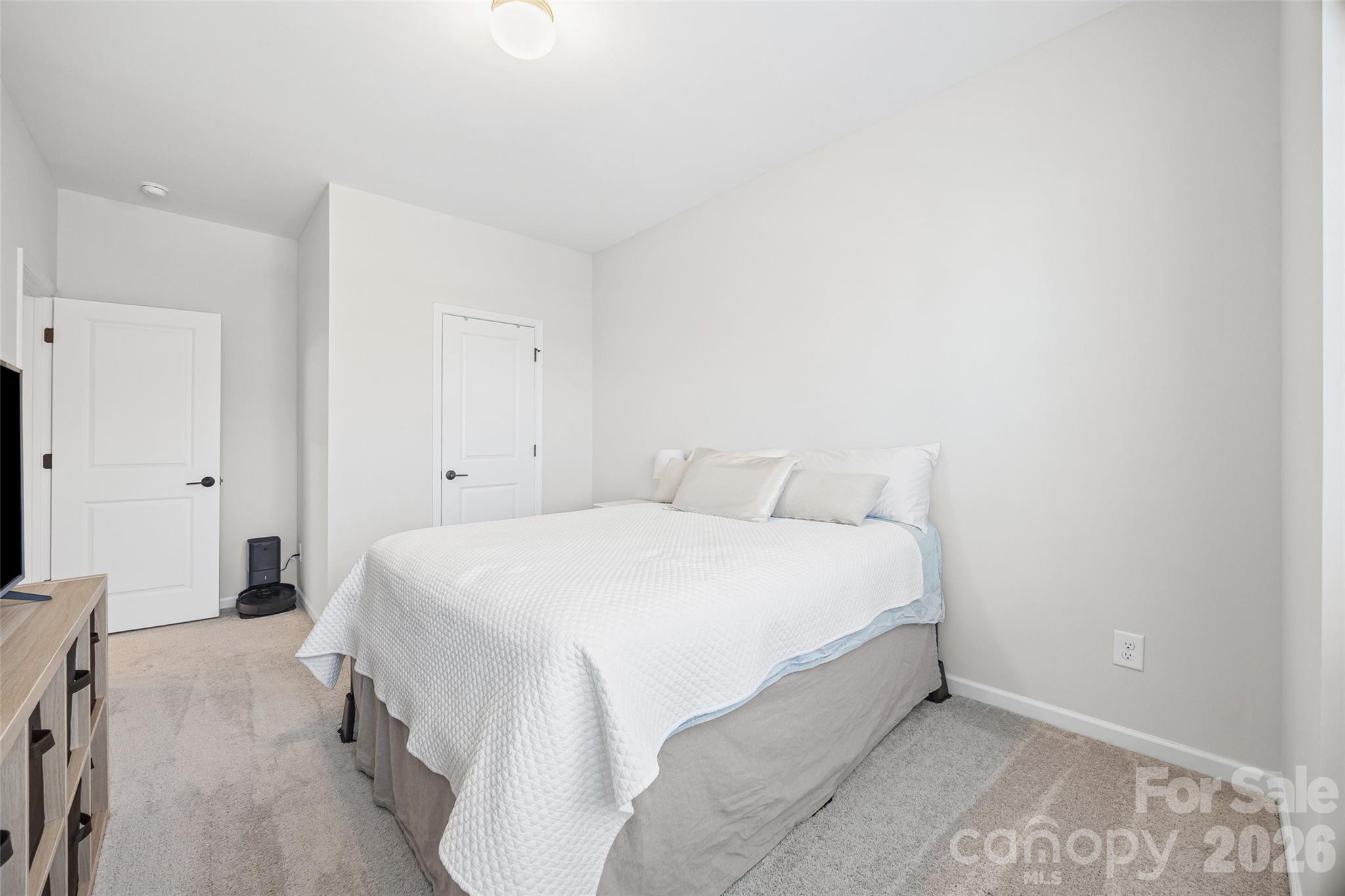 285 Brooks Springs Drive Fort Mill, SC 29708 - Photo 21 of 28 a bedroom with a bed and a flat tv screen