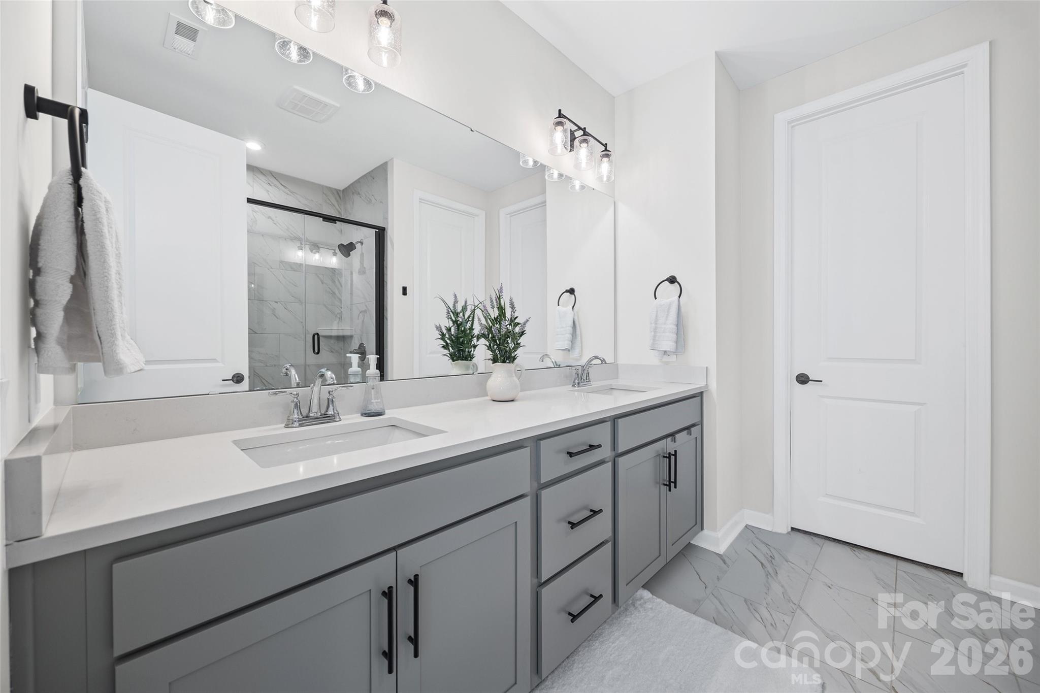 285 Brooks Springs Drive Fort Mill, SC 29708 - Photo 23 of 28 a bathroom with a granite countertop sink mirror and double
