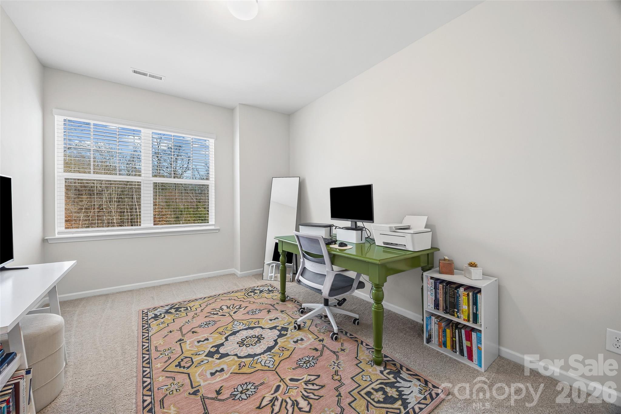 285 Brooks Springs Drive Fort Mill, SC 29708 - Photo 24 of 28 a view of a workspace with furniture and a window