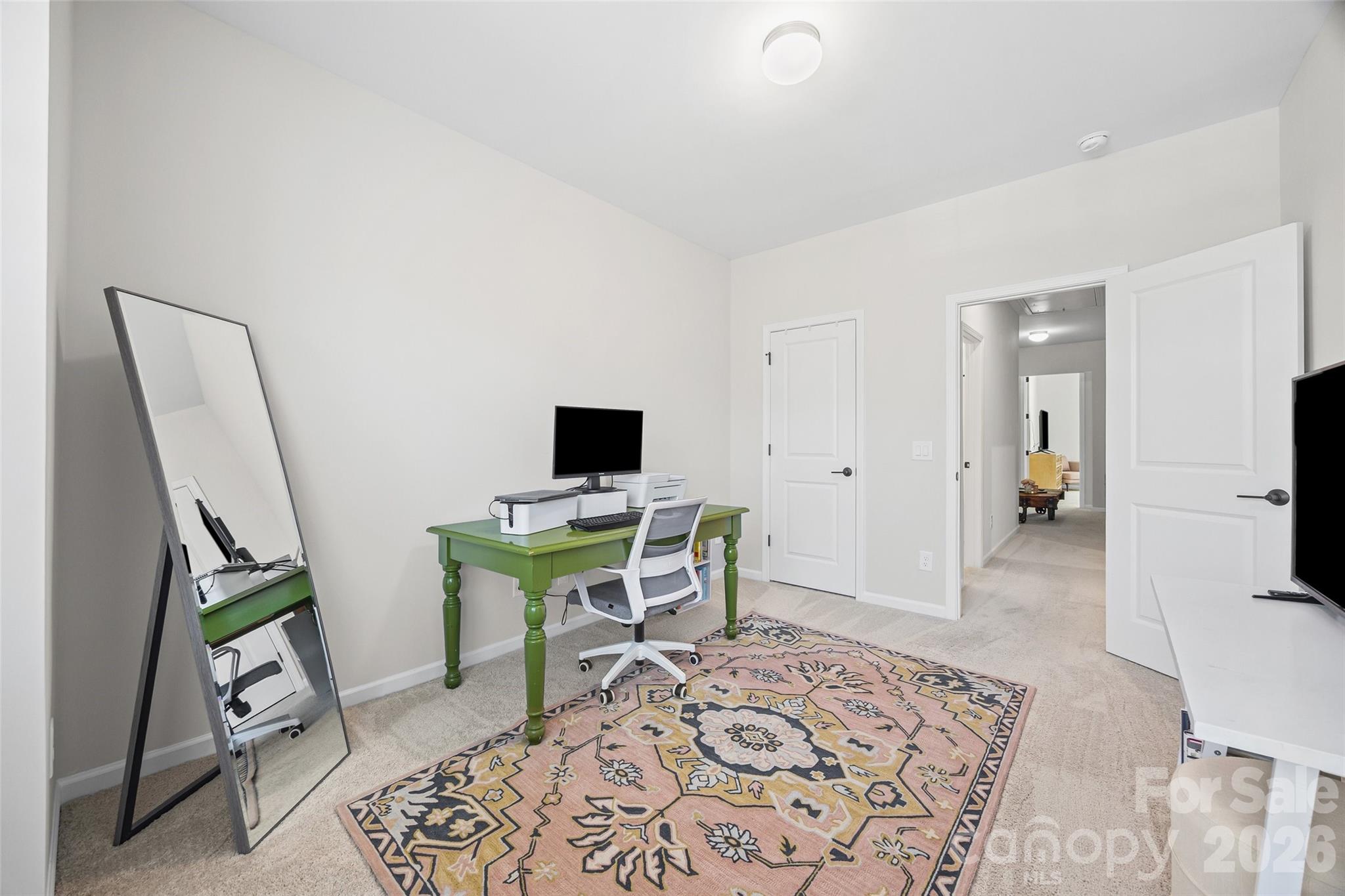 285 Brooks Springs Drive Fort Mill, SC 29708 - Photo 25 of 28 a view of a livingroom with furniture and a flat screen tv